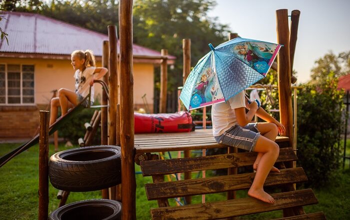 children playing on jungle gym